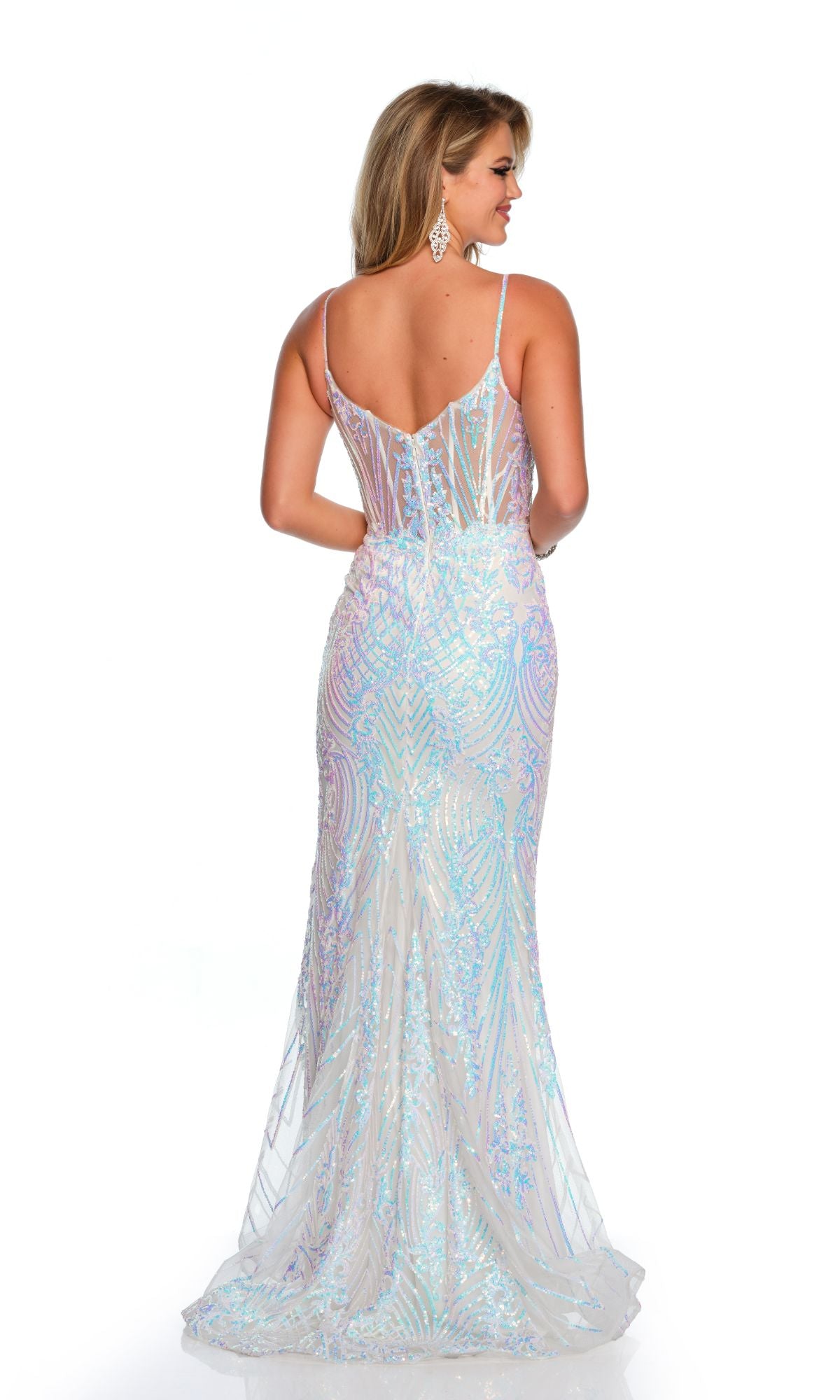 A woman stands with her back to the camera wearing the Dave and Johnny Long Formal Dress 11378—an iridescent, floor-length sequin gown with thin straps, a v-neckline, and sheer fitted bodice—set against a white background.